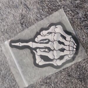Skeleton middle finger iron on patch